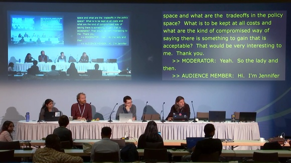 Four panelists discuss in front of an audience at Workshop number 267 of 2019's IGF